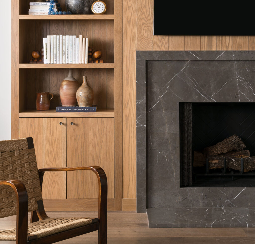 Pietra Gray marble fireplace featured in sitting room