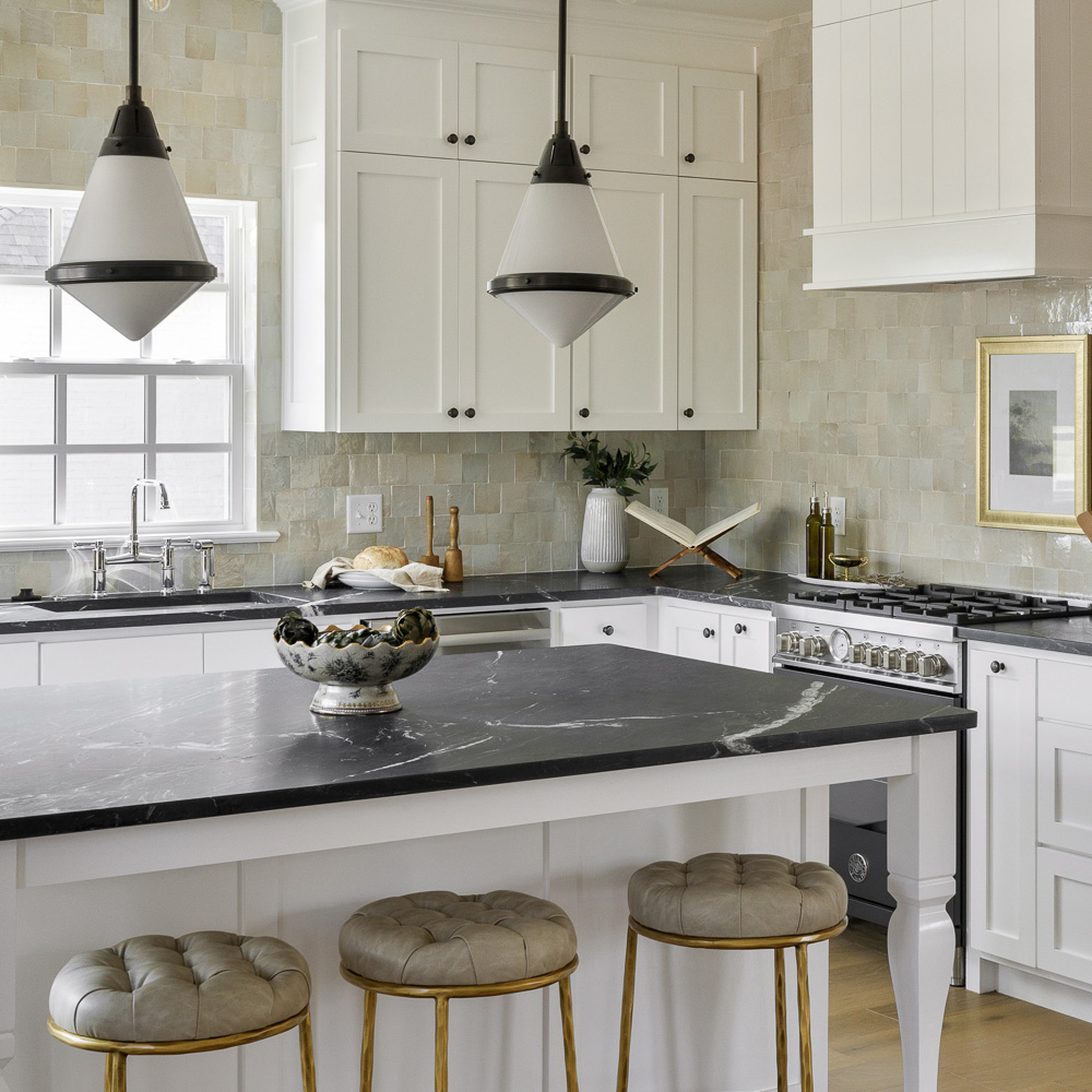 Black and white traditional kitchen with pendant lighting